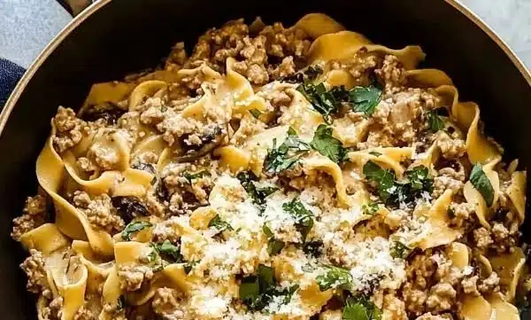 Creamy Turkey Stroganoff served in a bowl with herbs on top