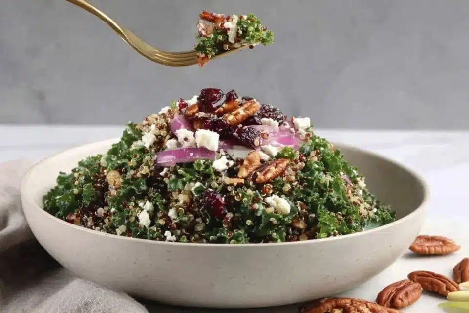 Colorful Cranberry Apple Quinoa Salad in a bowl with fresh ingredients