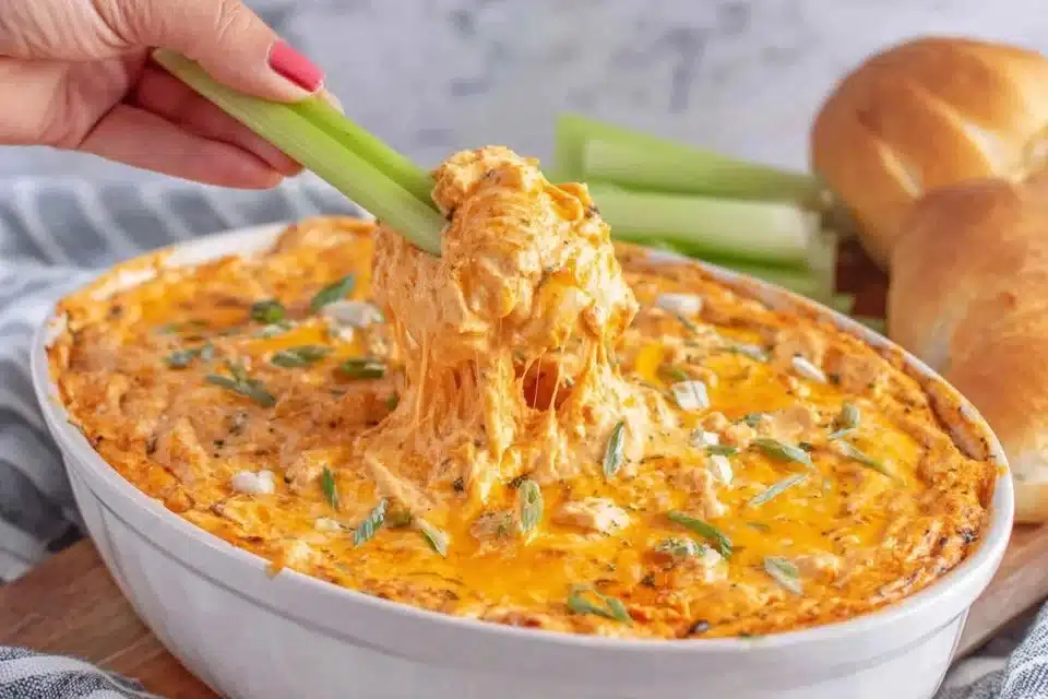 Easy buffalo chicken dip served in a bowl with tortilla chips