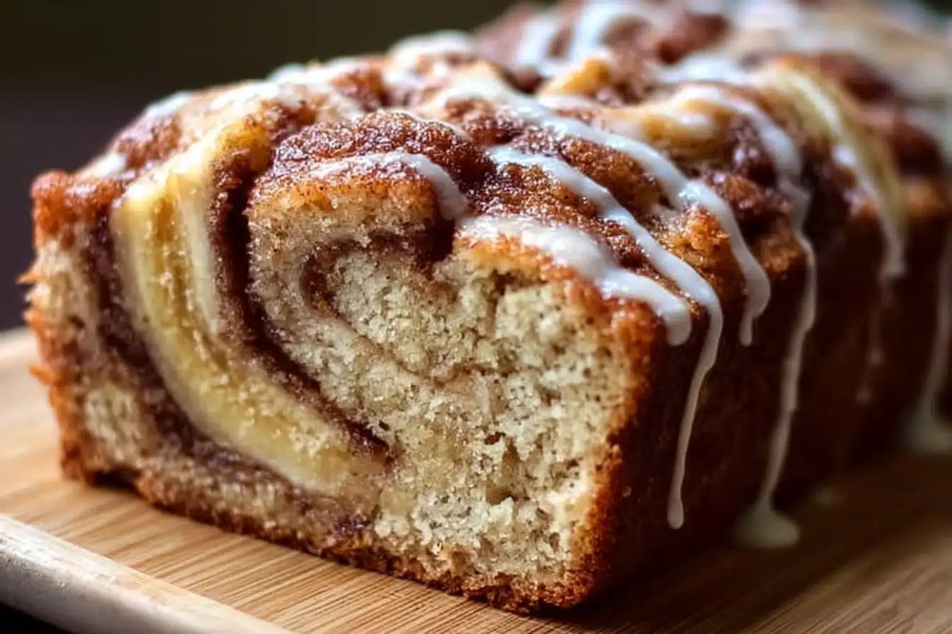 Delicious homemade easy cinnamon roll banana bread with a cinnamon swirl
